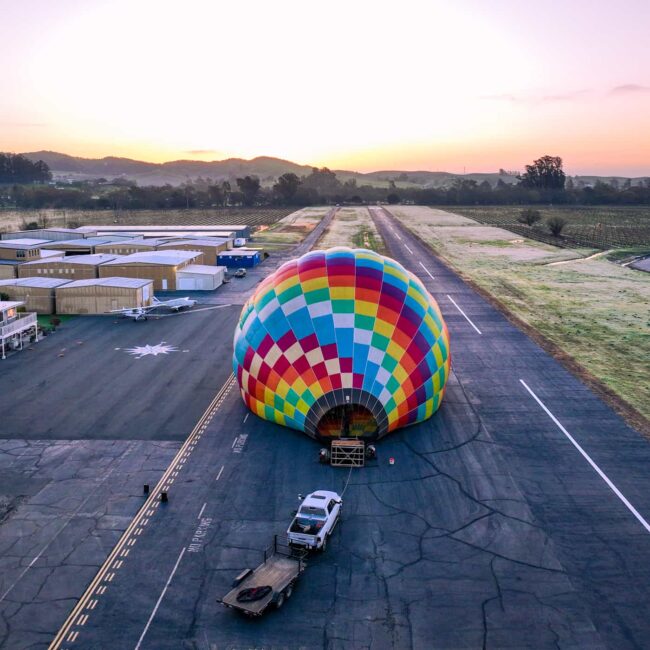 a hot air balloon on a runway